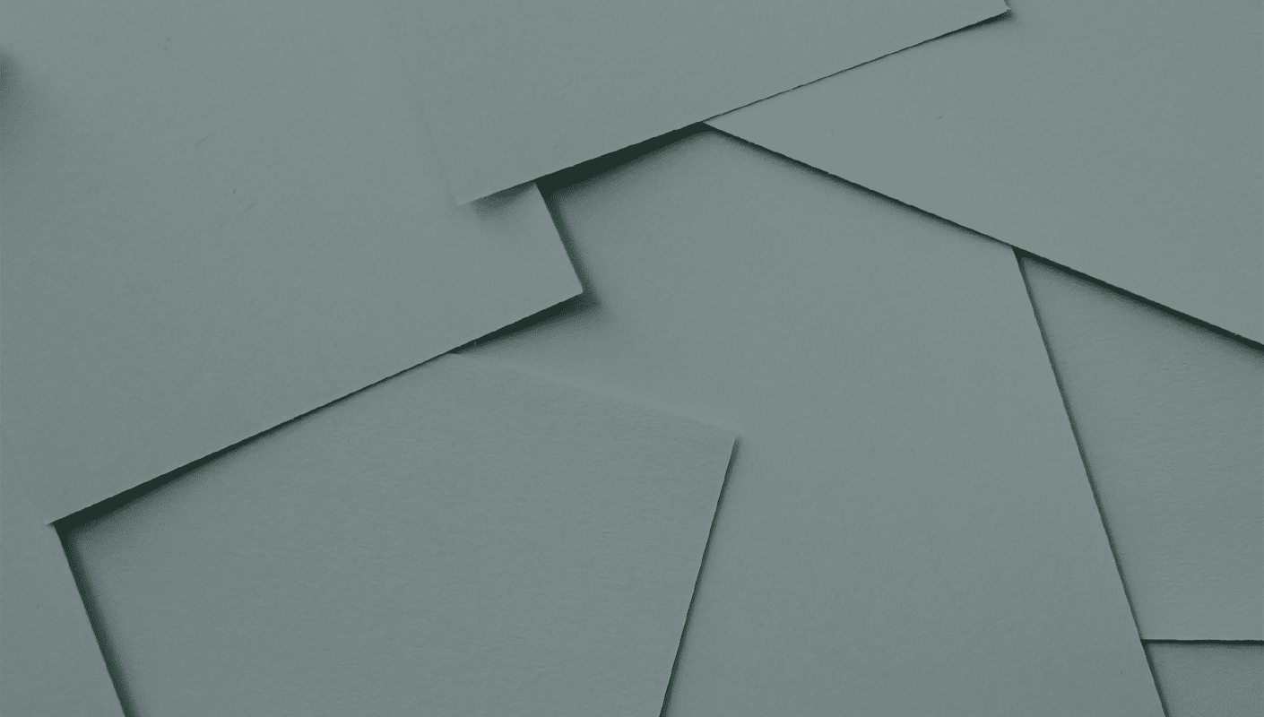 scattered sheets of white paper textured background