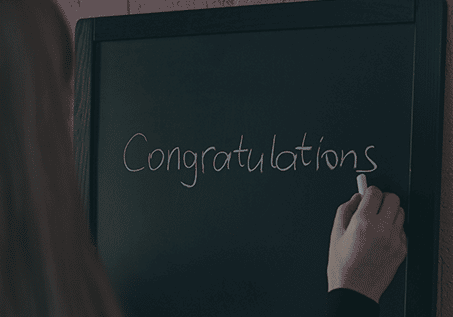 Congratulations written on a chalkboard